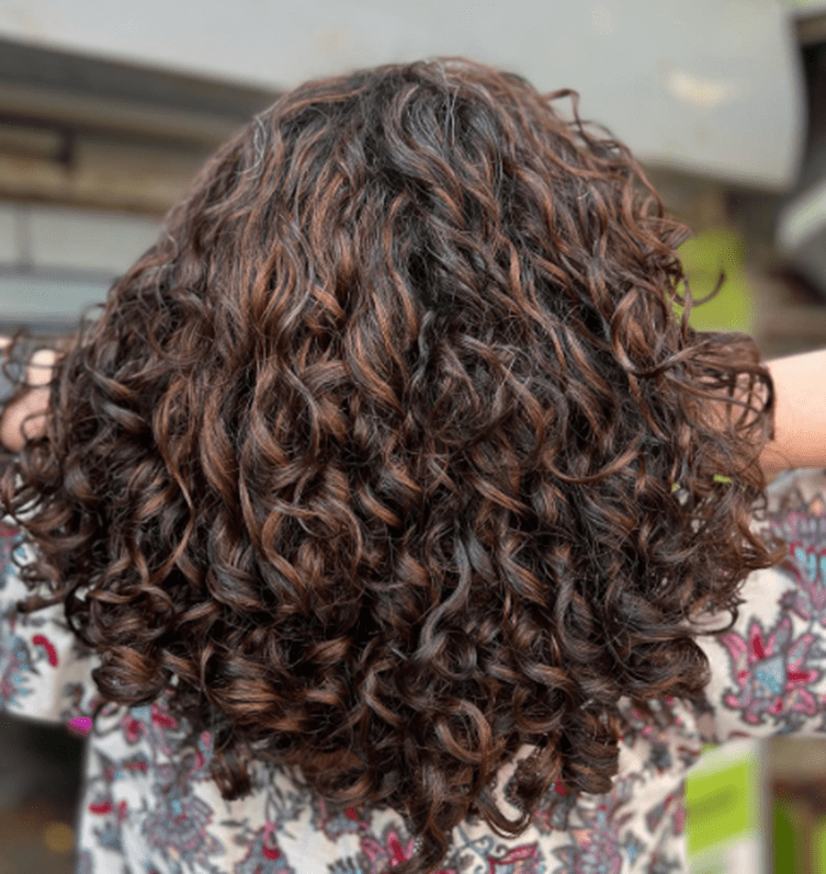 Curly hair color ideas that embrace your natural beauty
