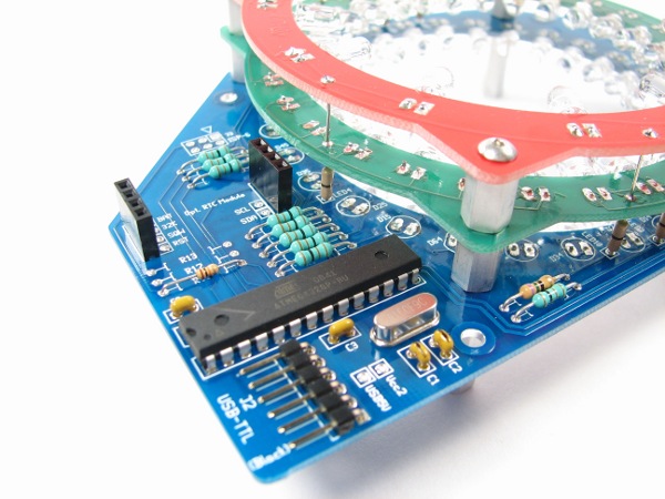 Bulbdial clock has no moving parts, casts shadows for hands