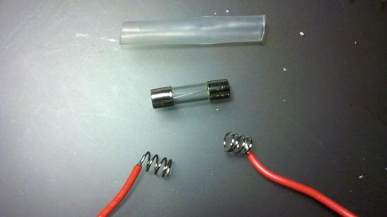 Heat shrink fuse holder