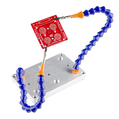 Third-hand tools are useful for holding components in place for soldering. You can make a Loc-Line modular hose-style third hand kit yourself (here's the instructables how-to), but cutting, drilling, and tapping a solid base can be a hassle. SparkFun's kit comes with 2 complete arms and a tapped base plate that can accept additional arms ($2/each).