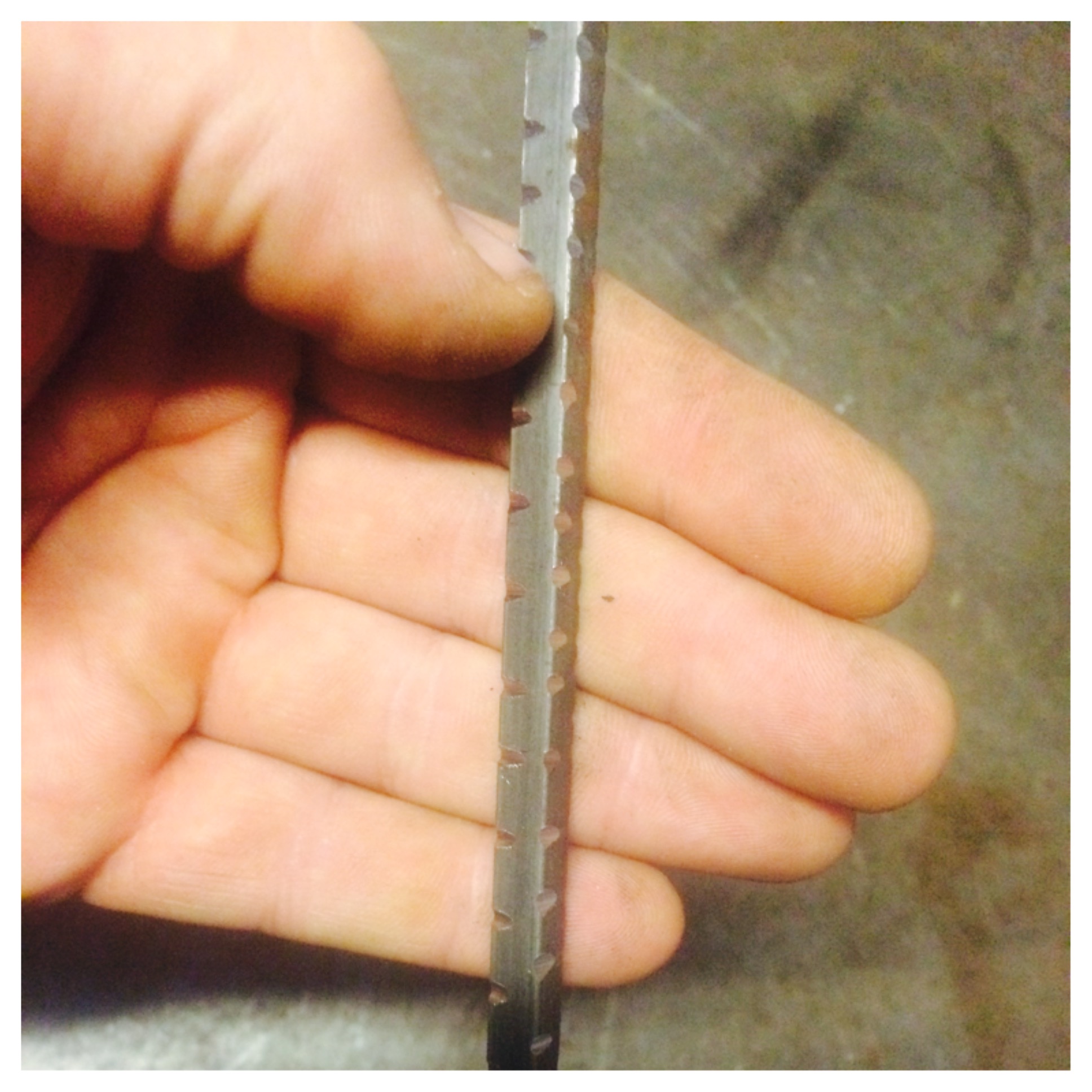 I start the tiger twist by laying out 6 inches of hash marks on all 4 corners of a 3/8" square stock. I used a grinder with a cutting disk but you can use a file or hacksaw, either would work.