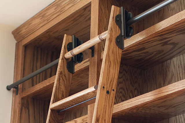 I bought a sliding barn door hardware kit as well for my ladder that i am planning on placing in the living room. The Built-in Bookshelves and Rolling Ladder in the Library