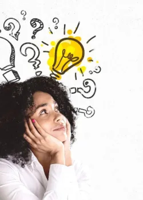 woman with questions and light bulb in background