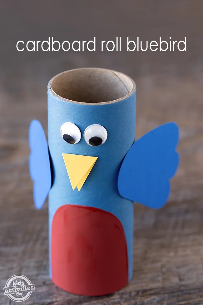 Toilet paper roll bluebird craft for kids with colored paper wings and googly eyes, easy spring bird craft for preschoolers