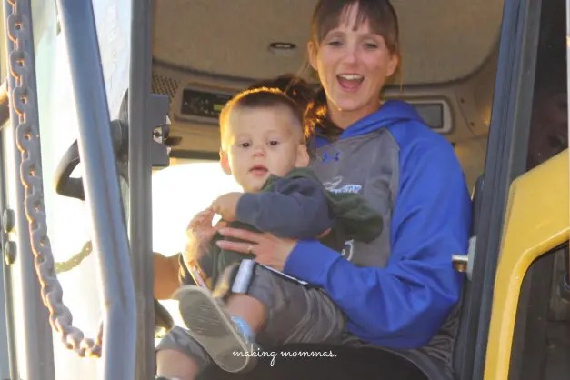 image of mom and boy on tractor