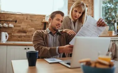 image of a couple reviewing finances