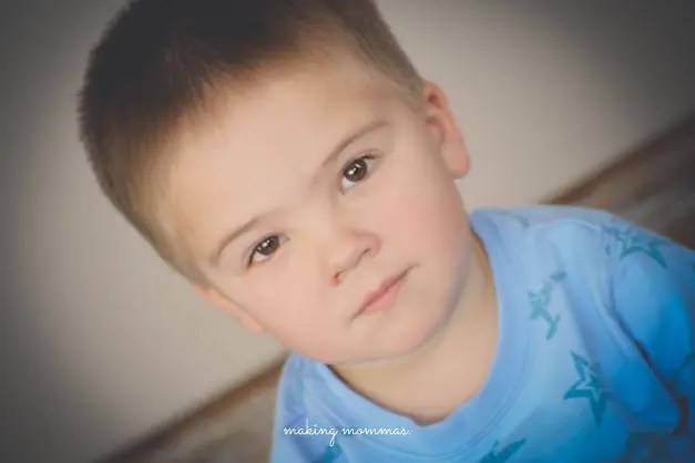 image of a sad looking little boy with brown eyes