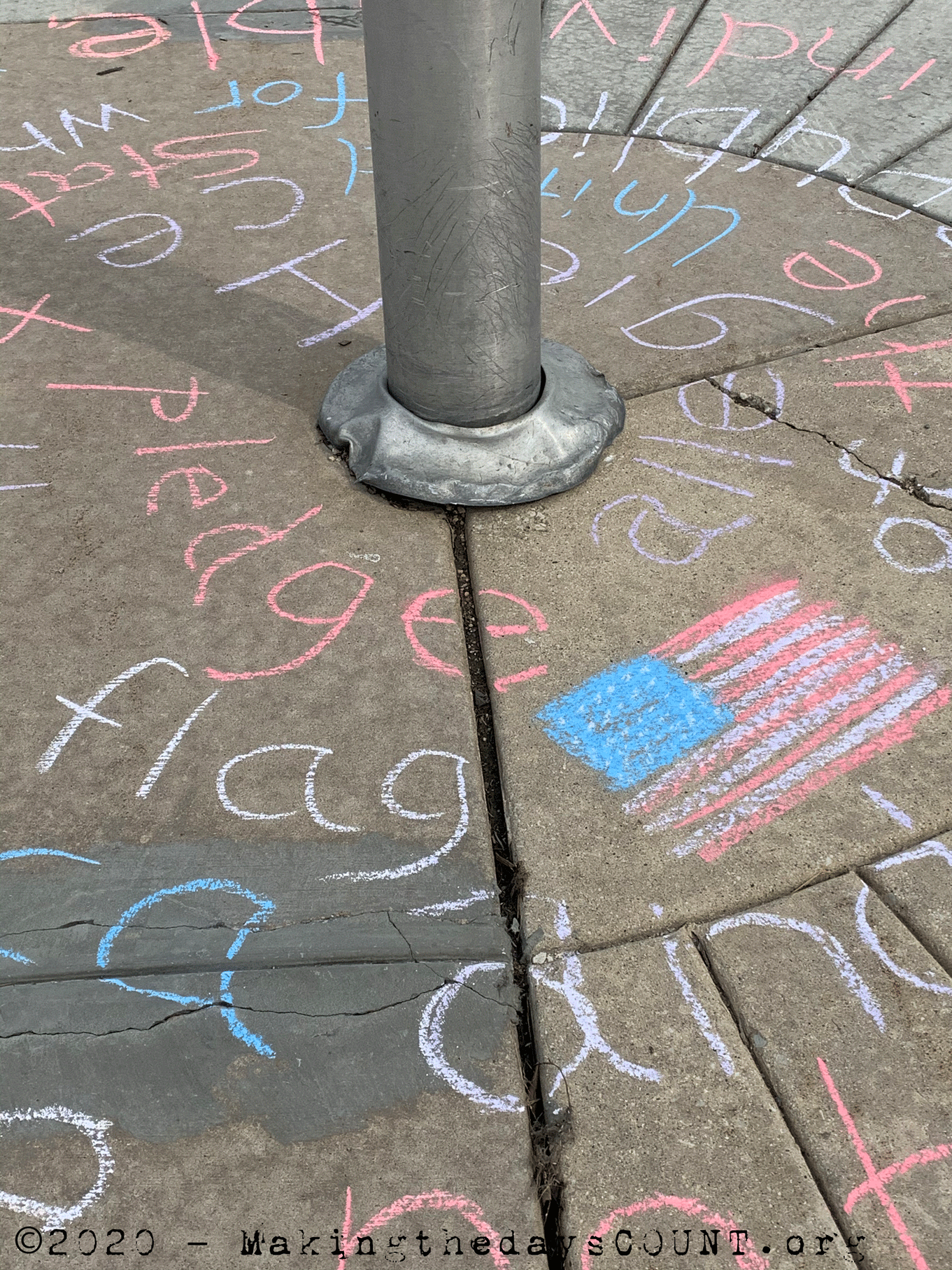 tagging the school's flagpole with the Pledge of Allegiance