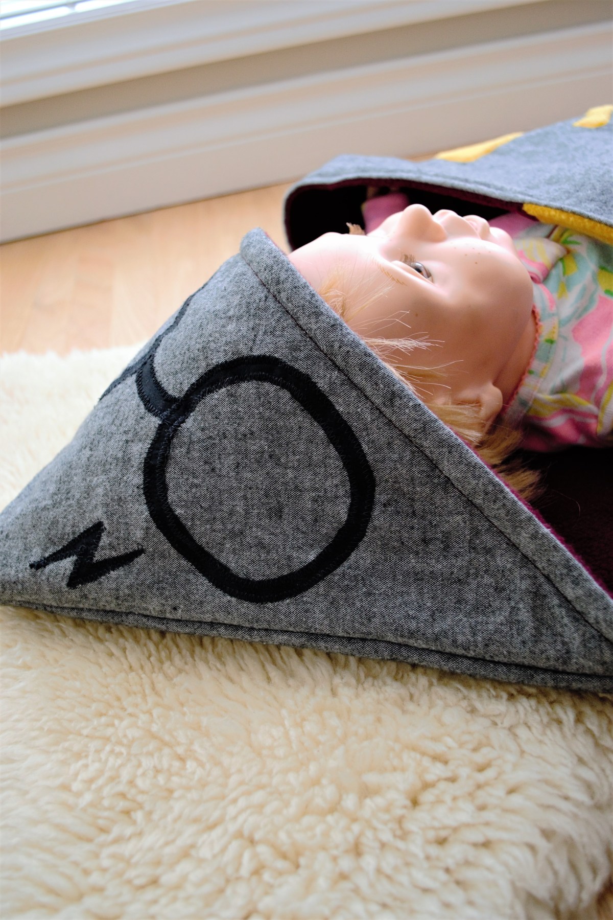 How to Make a Reversible Hooded Baby Blanket - baby model