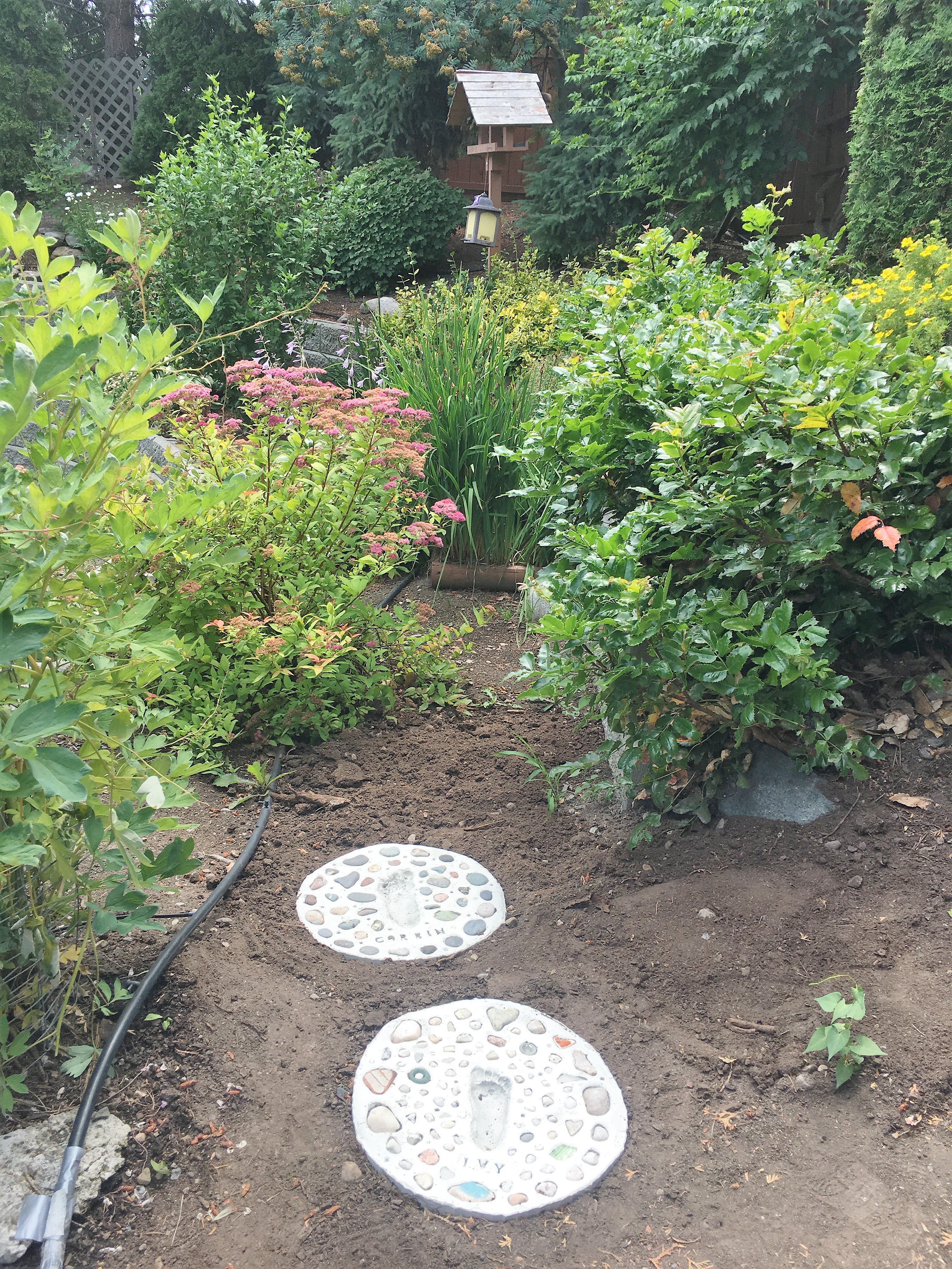 DIY Stepping Stones: Kids Footprint Keepsakes- With DIY Cement Molds! - garden stepping stones