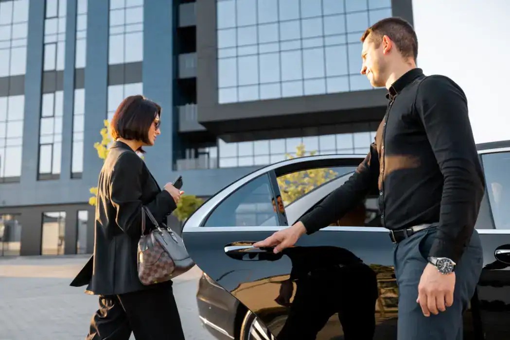 Luxury chauffeur service at Mak Louren with professional driver and premium vehicle.