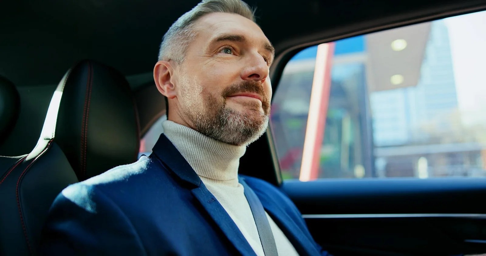 Professional chauffeur in a luxury vehicle for Mak Louren Chauffeur Service.