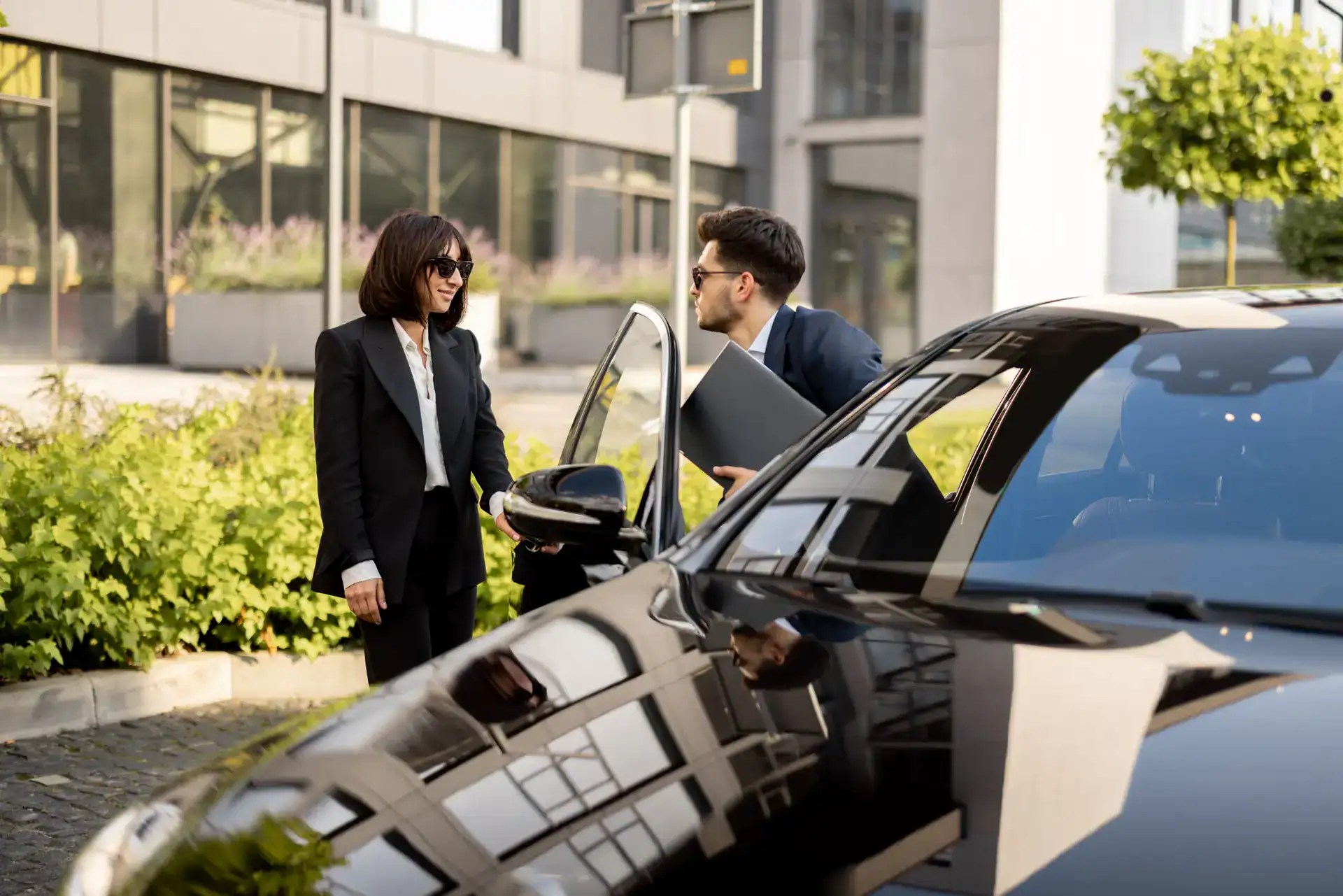 Luxury chauffeur service for business clients in an urban setting.