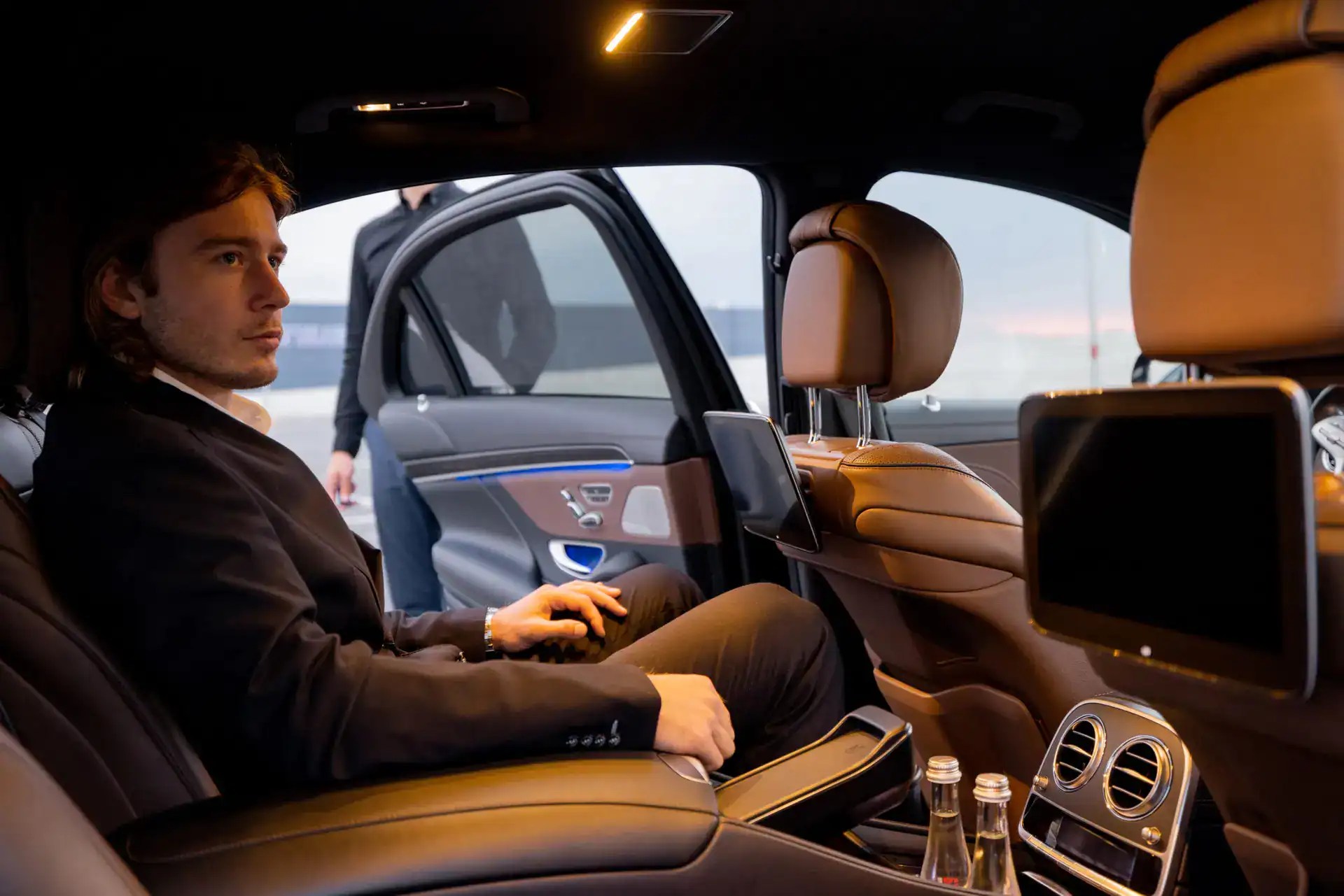 Luxury chauffeur service with comfortable seats and modern amenities.