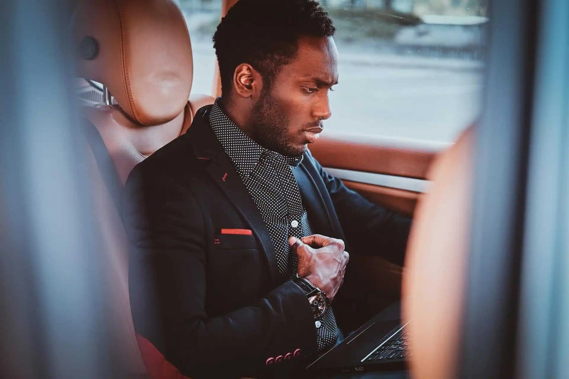 Luxury chauffeur service for professional clients and VIPs in a high-end vehicle.