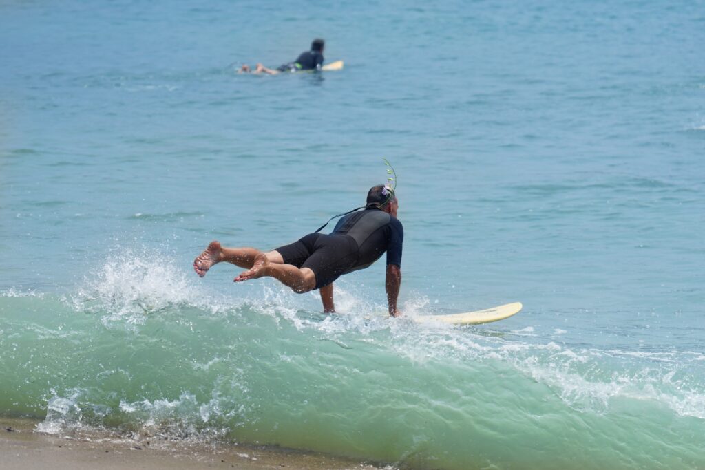 Malibuites say goodbye: Remembering Randy 'Crawdaddy' Miod 2025 Randy Craw Daddy Paddle Out DSC01403 2 Surf leap