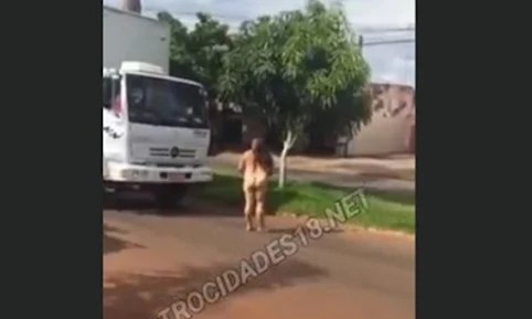 Mulher em surto sobe pelada em caminhão