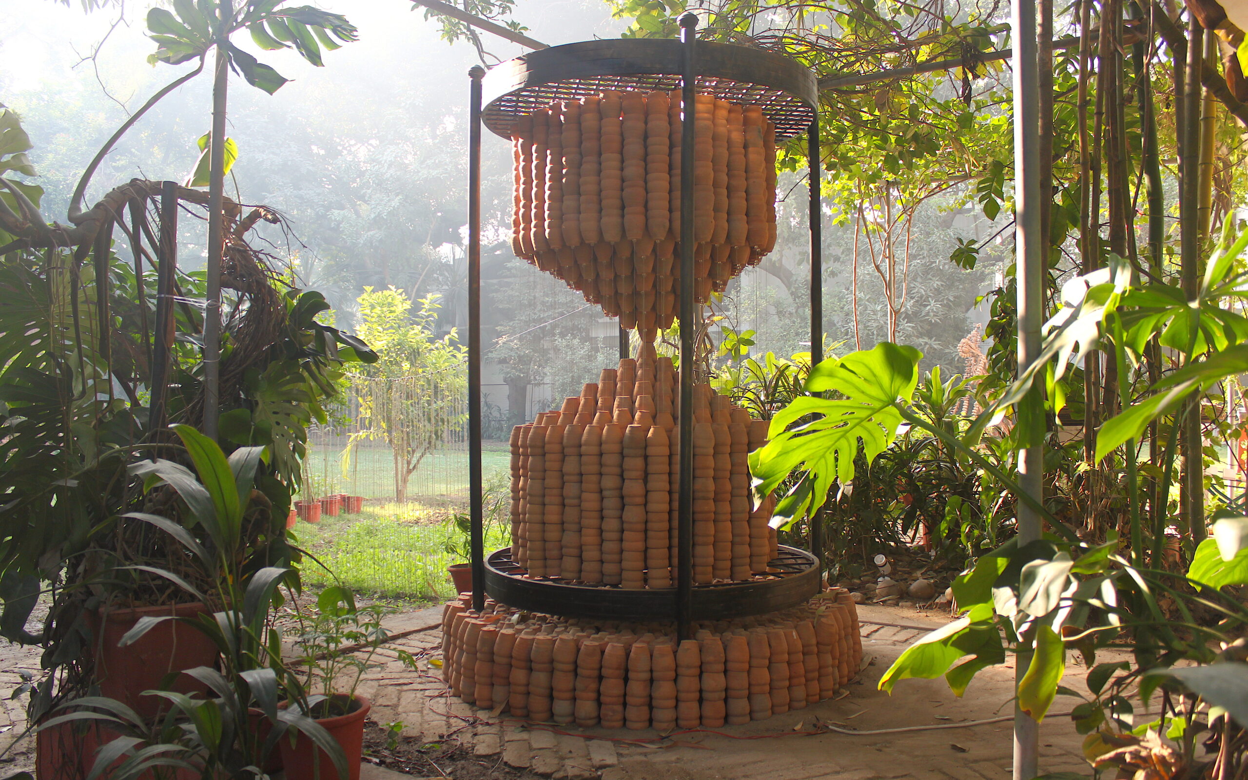 Manav Gupta, Hourglass, Time Machine, Art and Sustainability, Climate Change, Environment Consciousness, Manav Gupta Artist, Manav Gupta Installations, Paintings, Works, Indian Contemporary Art, Sculpture, Manav Gupta Sculptures and Installations, Water, Time, Pottery