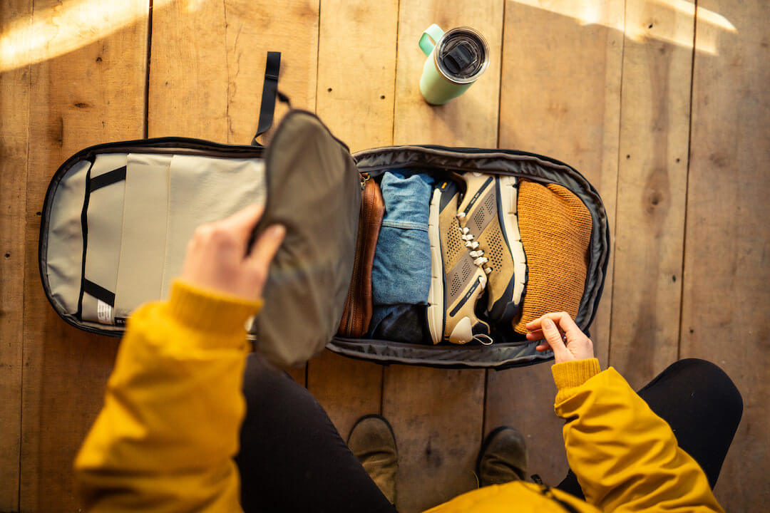 This photo shows the top view of a packed YETI Crossroads Backpack.