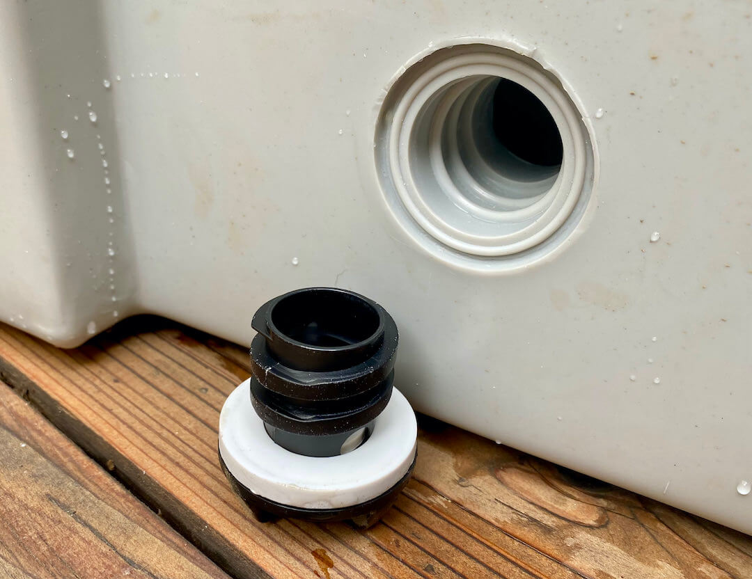 This photo shows the largest drain port in the RTIC 65 QT Hard Cooler.