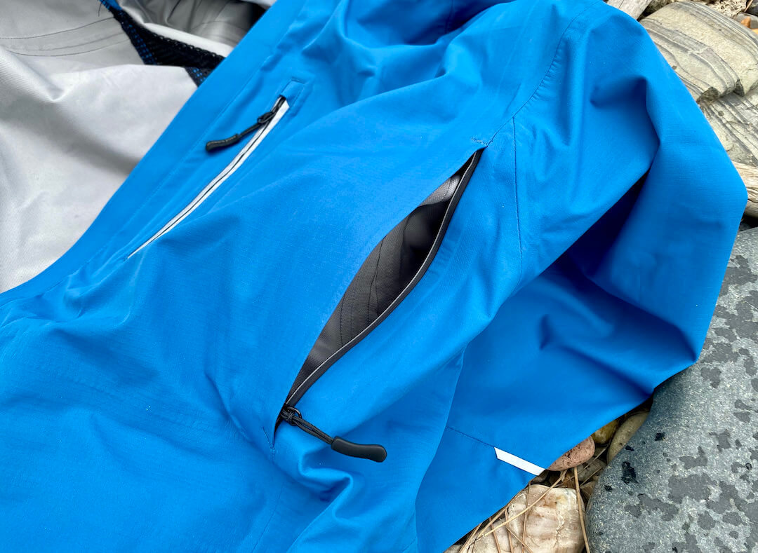 This photo shows a closeup of an open core vent on the Showers Pass Transit Jacket CC.