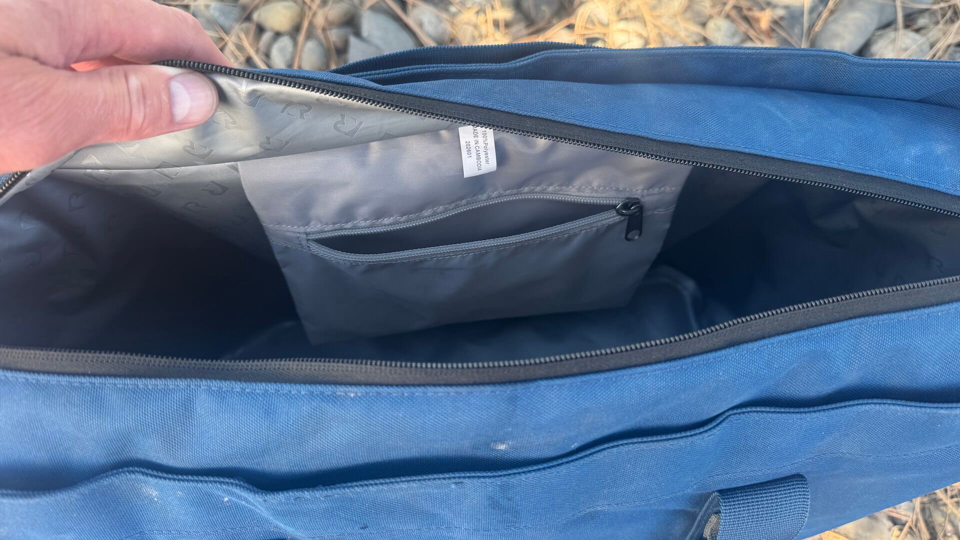 Interior stash pocket in RTIC insulated tote bag.