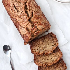 Refined Sugar Free Banana Bread with a Peanut Butter Swirl overhead view with slices cut out