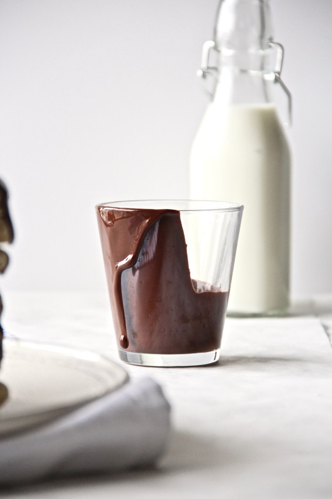 chocolate sauce dripping from a glass