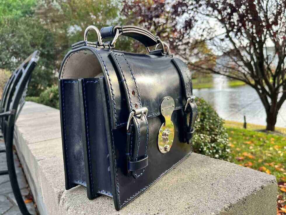 Marcellino NY m4: Navy Bridle Leather Mini Case, On a stone wall by the pond (4 of 7)