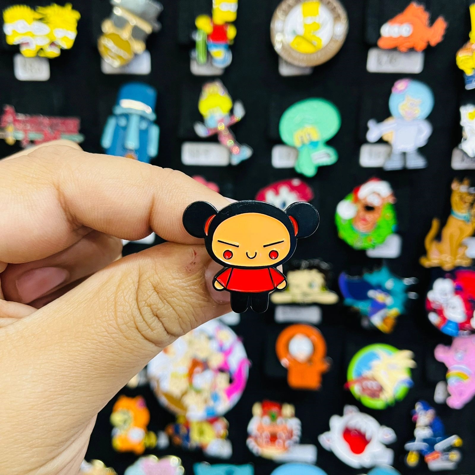 Pin metálico Pucca