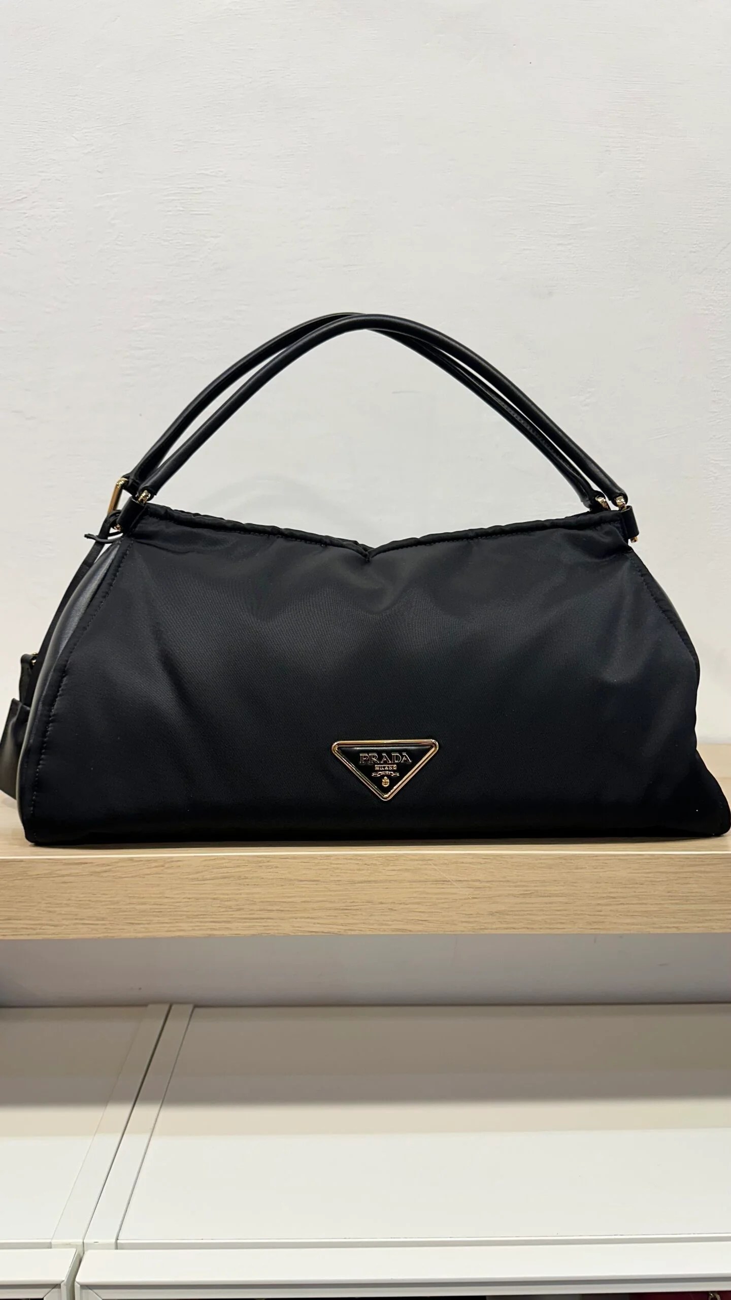 PRADA Borsa Prada in Re-nylon e pelle nera — DelixGo Luxury Bags