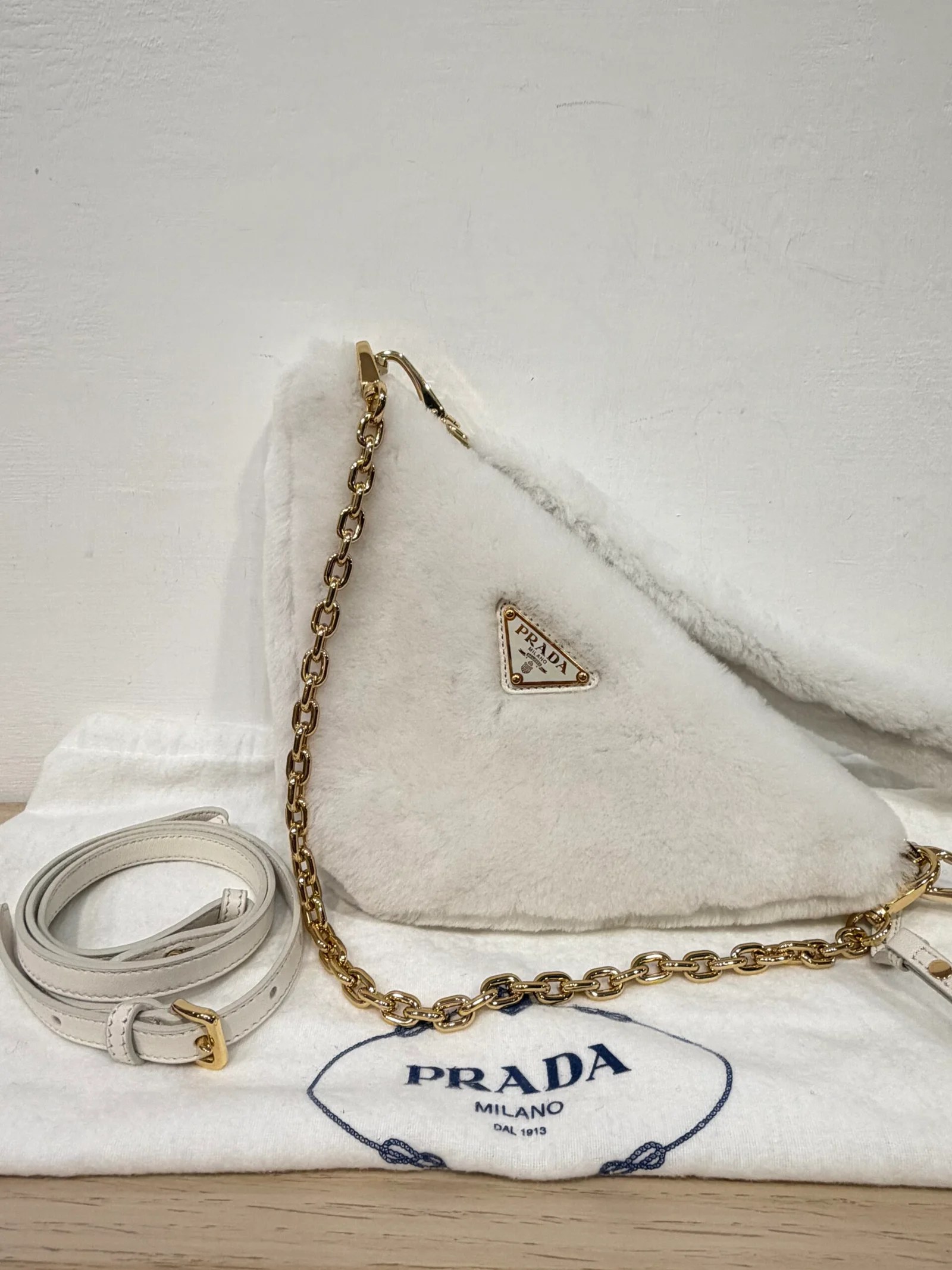 PRADA Triangle in montone bianco — DelixGo Luxury Bags