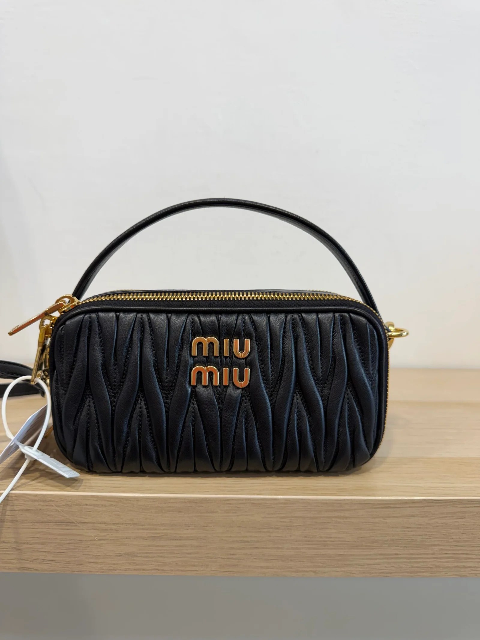 MIU MIU Vanity in pelle matelassé nera — DelixGo Luxury Bags