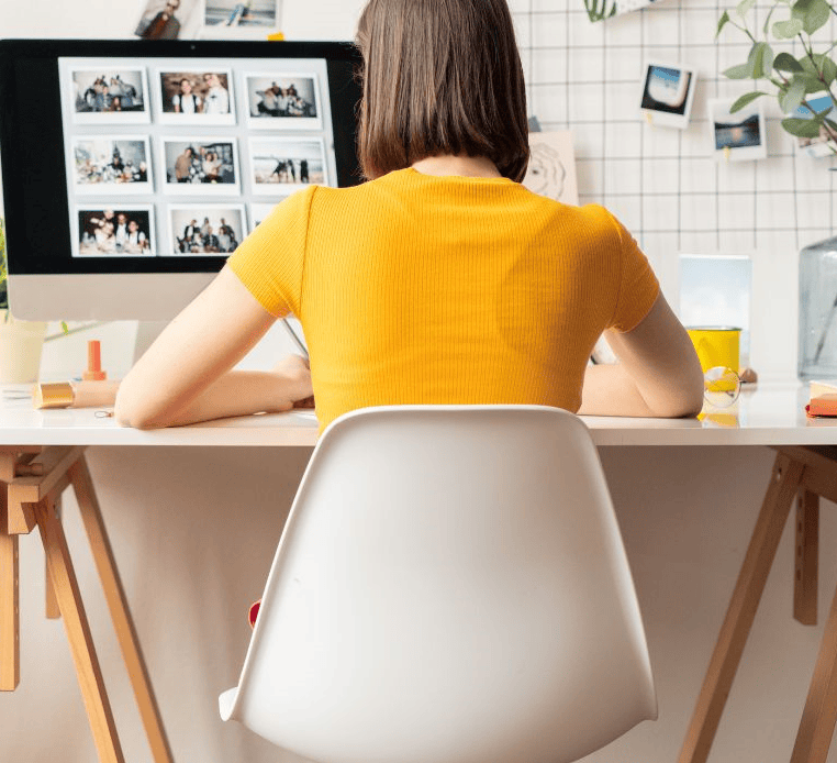 woman working remotely at her desk