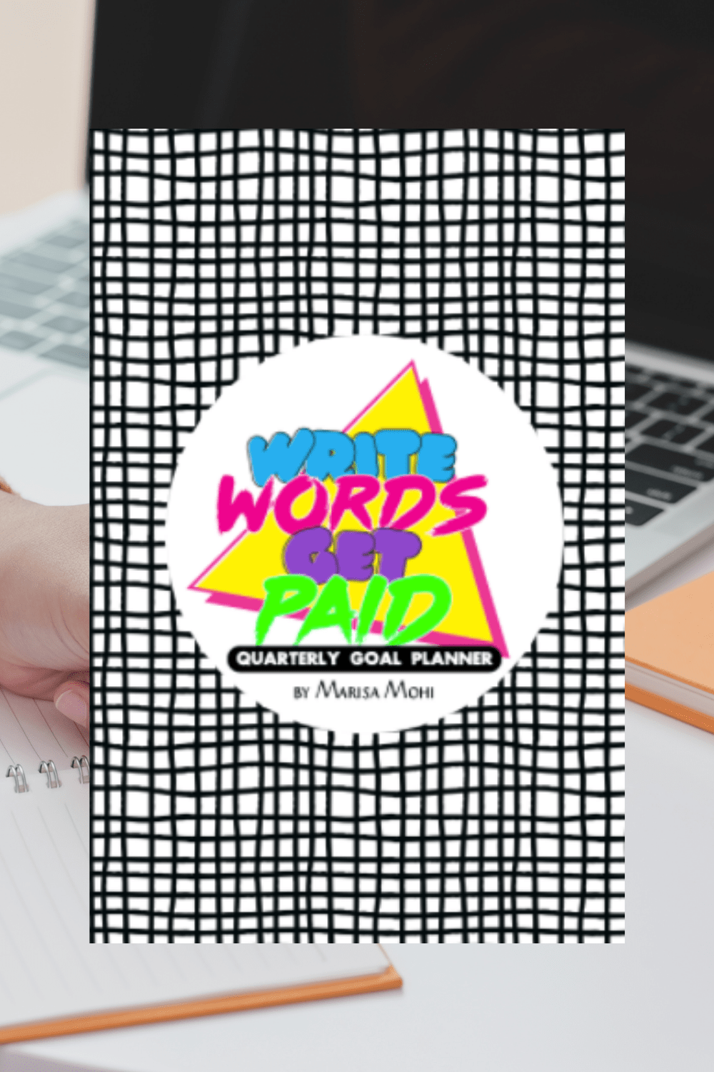 a laptop and pen with an image of the write words, get paid planner