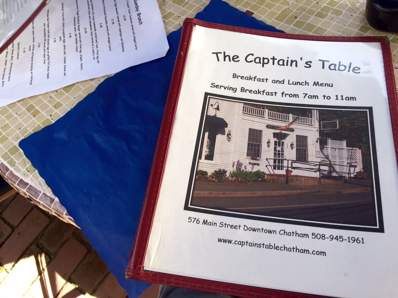 The Captain shares his table with us.