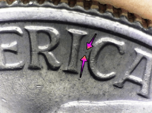 microscopic image of arrows noting a die dot the reverse of a 1976 bicentennial quarter dollar coin