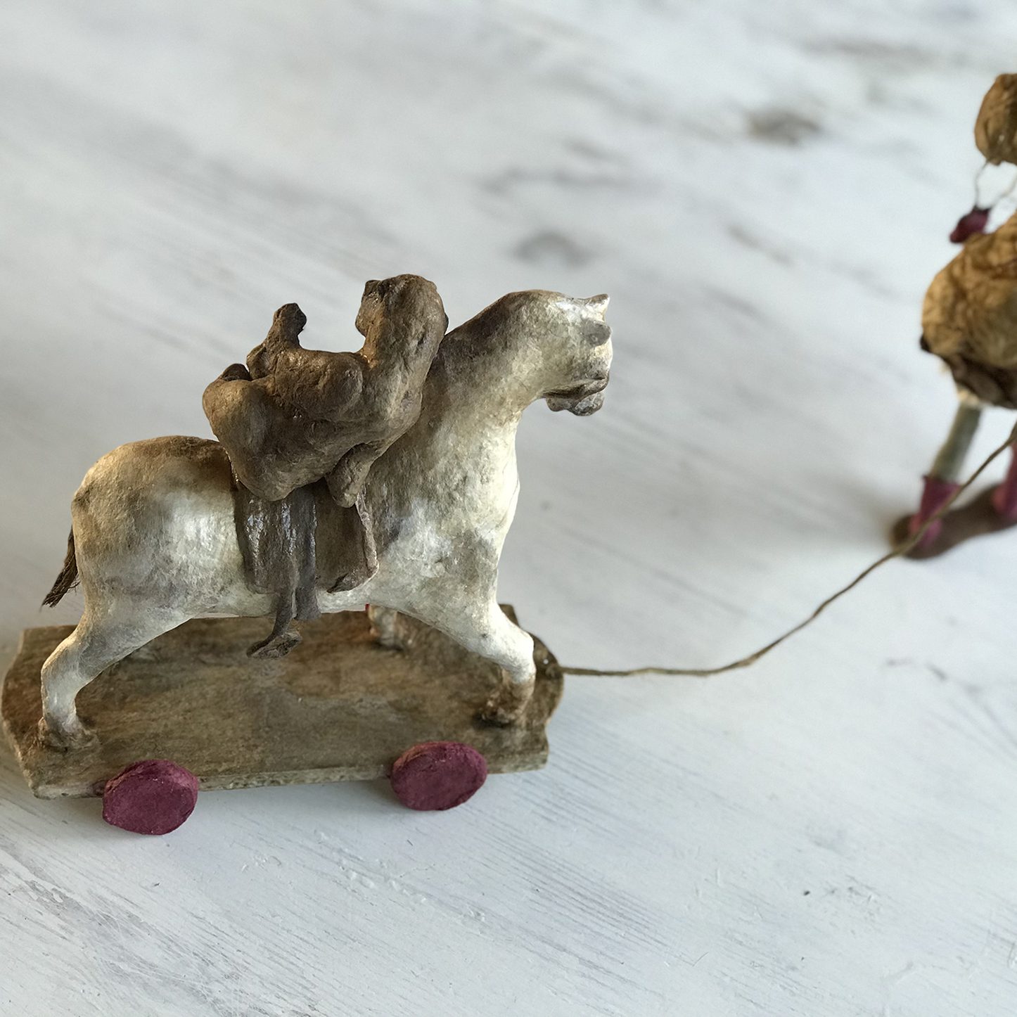 The dragged horse with the teddy bear