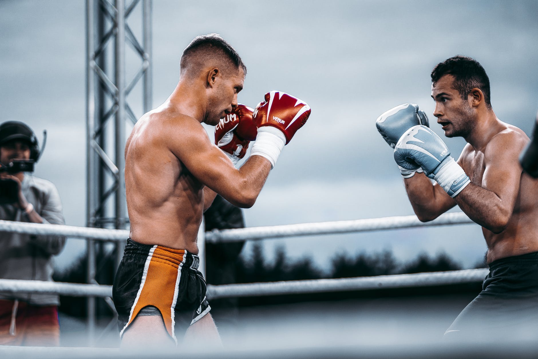 two men topless boxing