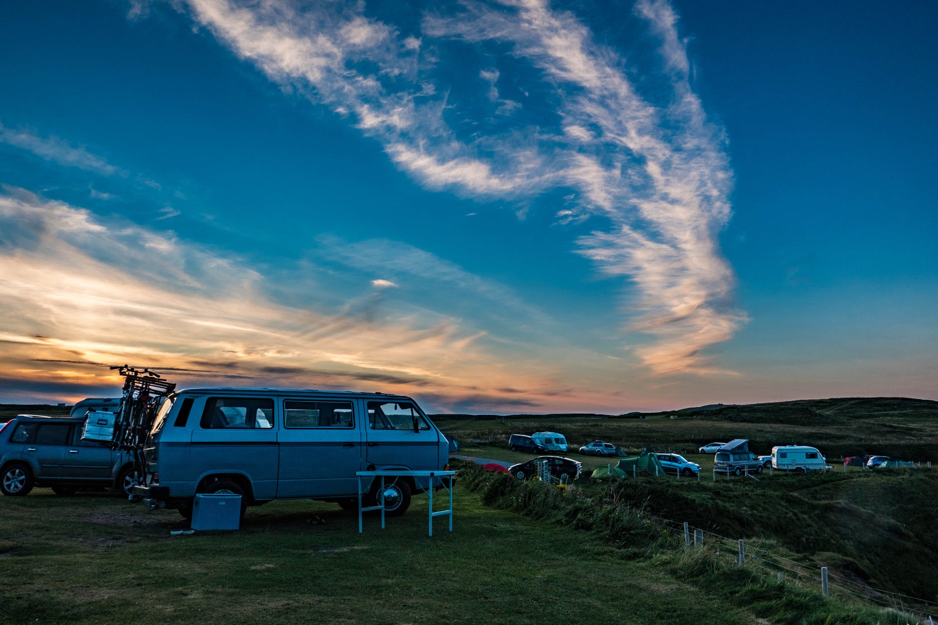 vehicles parked on field