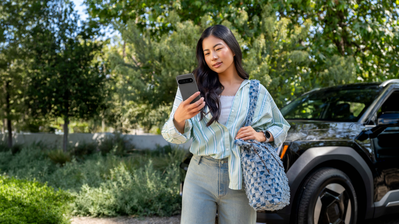 Google official image showing a person using personalized Search and News features on a phone