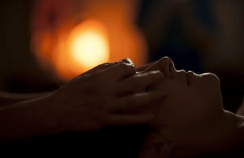 A woman receiving scalp massage