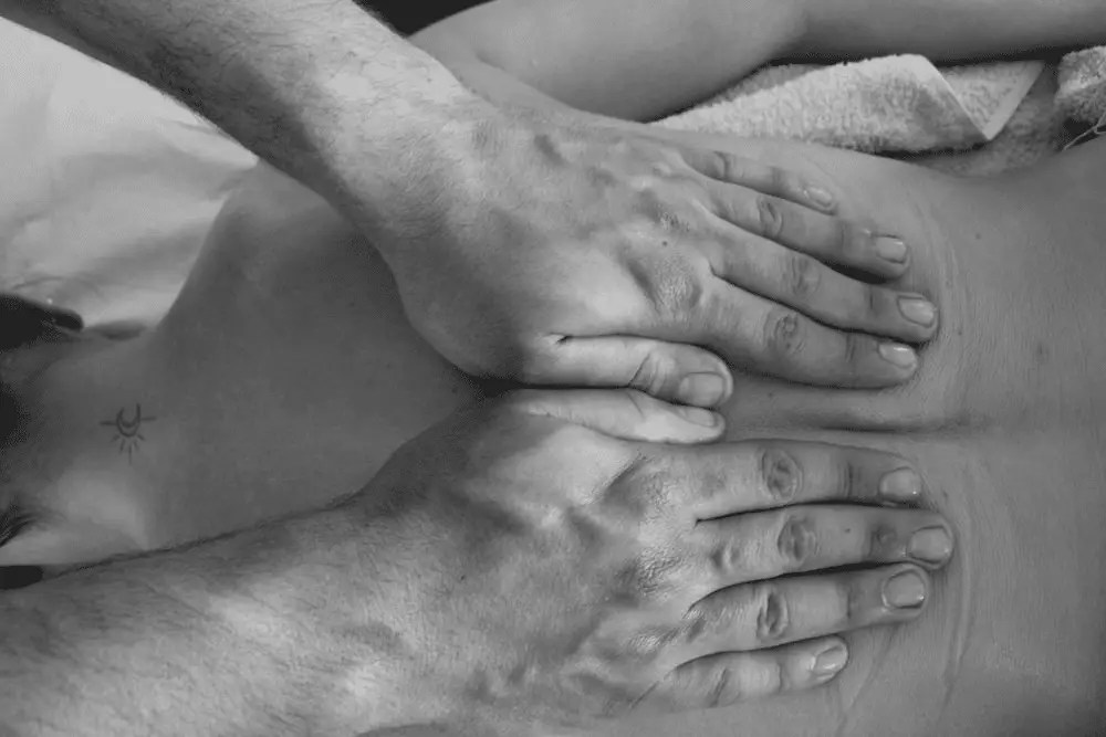 A woman getting a custom massage in Minneapolis