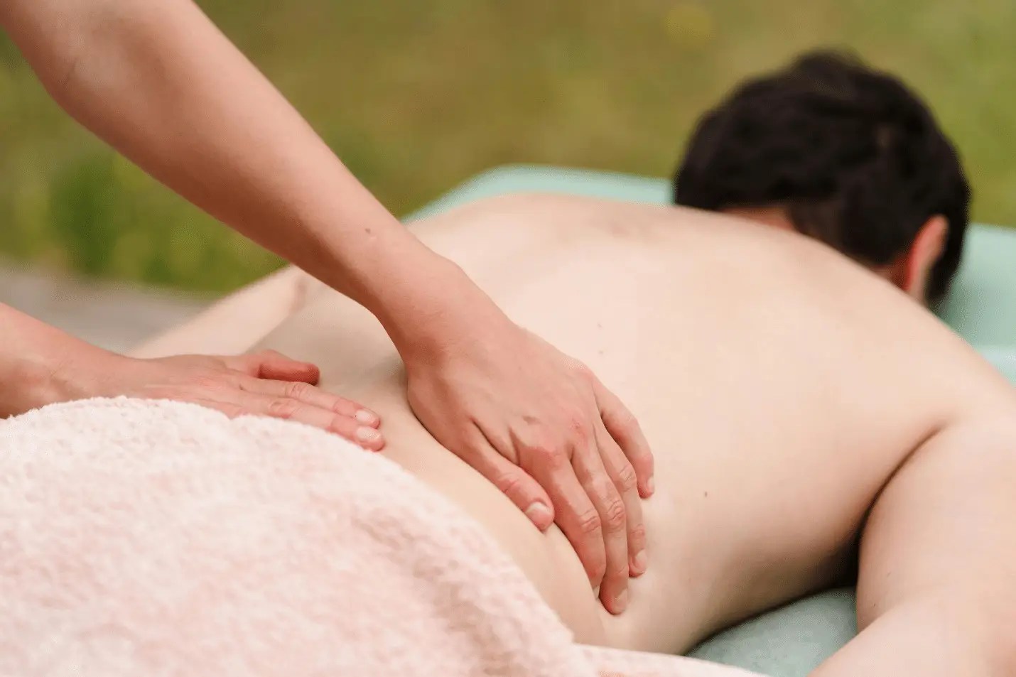 A person giving a full body massage