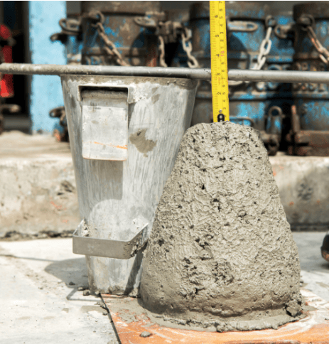The image shows ready-mixed concrete that is being sampled and tested for ASTM C94 slump, air content, temperature, and quality.