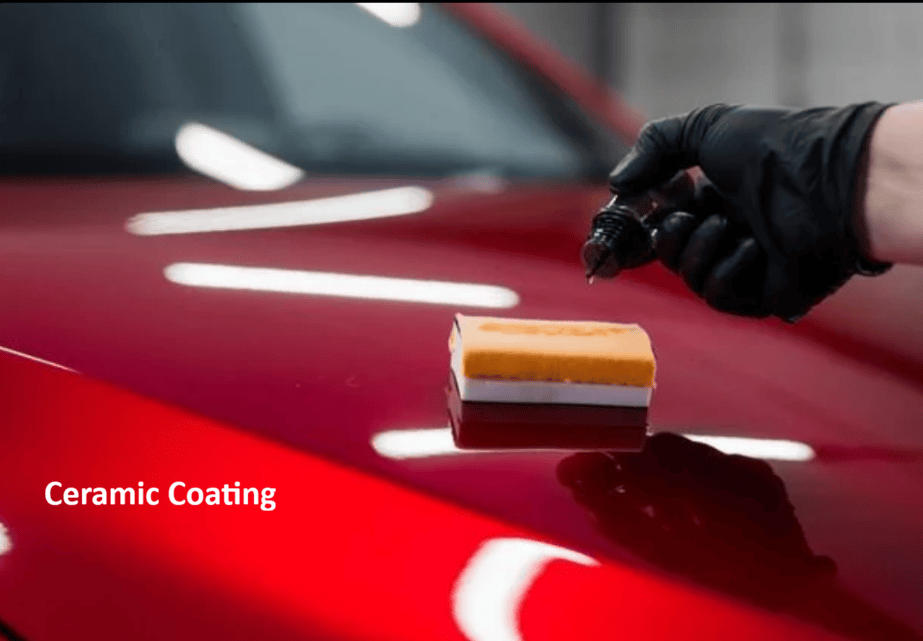 A photo showing red ceramic coating being done over a car body. The adhesion strength and mechanical failure of such coating are evaluated by ASTM C1624 standard.