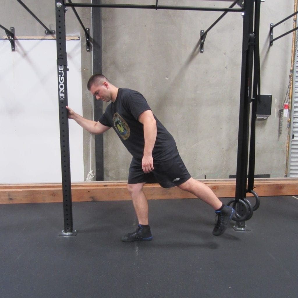 Hip activation squat warm up exercise 4