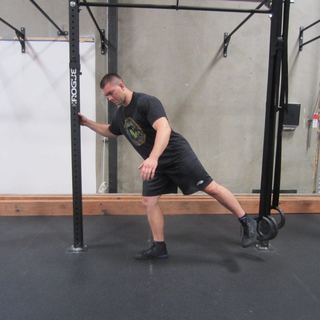 Hip activation squat warm up exercise 2