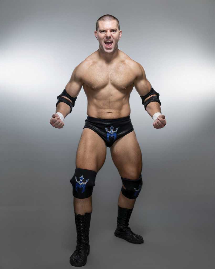 Independent Professional Wrestler Mathias doing his signature flex pose