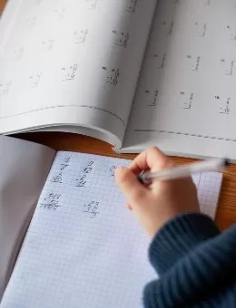 high-angle-girl-learning-math-school